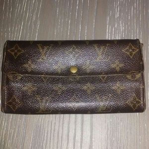 Authentic Louis Vuitton Monogramed Sarah wallet